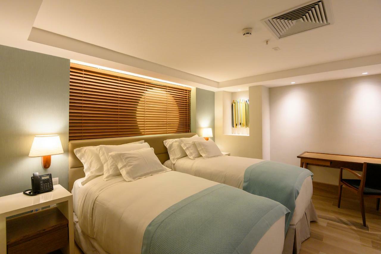 Vogal Luxury Beach Hotel & Spa Natal Buitenkant foto A room at the hotel